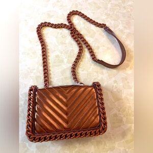 SOLD Aldo mini cross-body bag in metallic rose gold /rust with matte chain strap